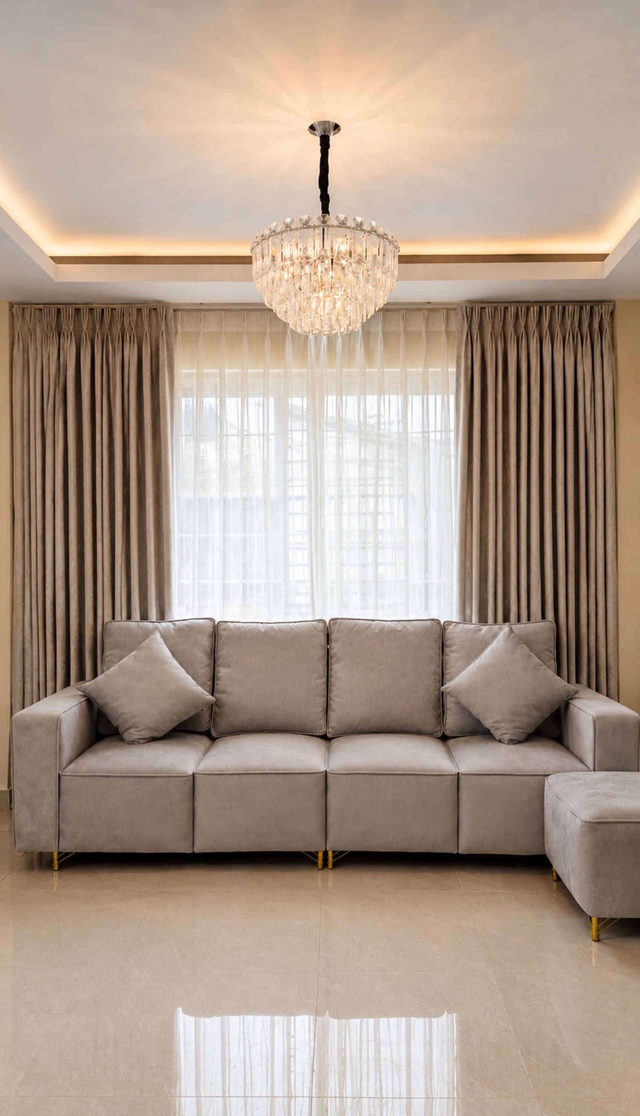 Custom-tailored curtains in a styled living room