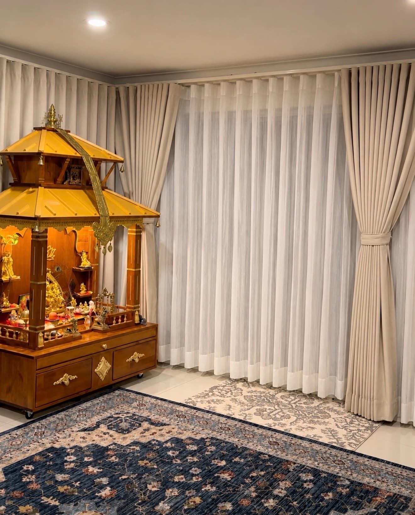 Elegant sheer drapes filtering natural light in a modern Nepali home